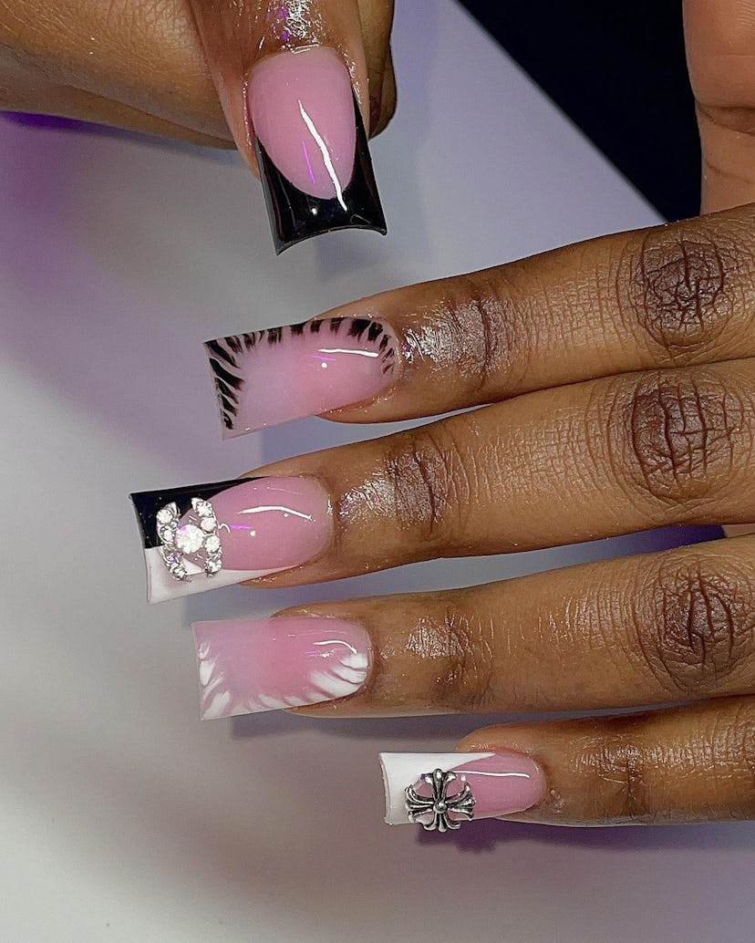 A flared duck nail shape is perfect for Aquarius signs.