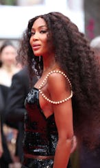 Naomi Campbell attends the 77th Cannes Film Festival Red Carpet wearing a sequined Chanel Gown from ...