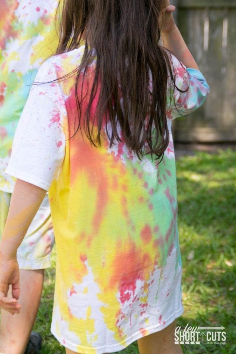 Enjoy a fun tie-dye summer craft like these water gun tie-dye shirts.