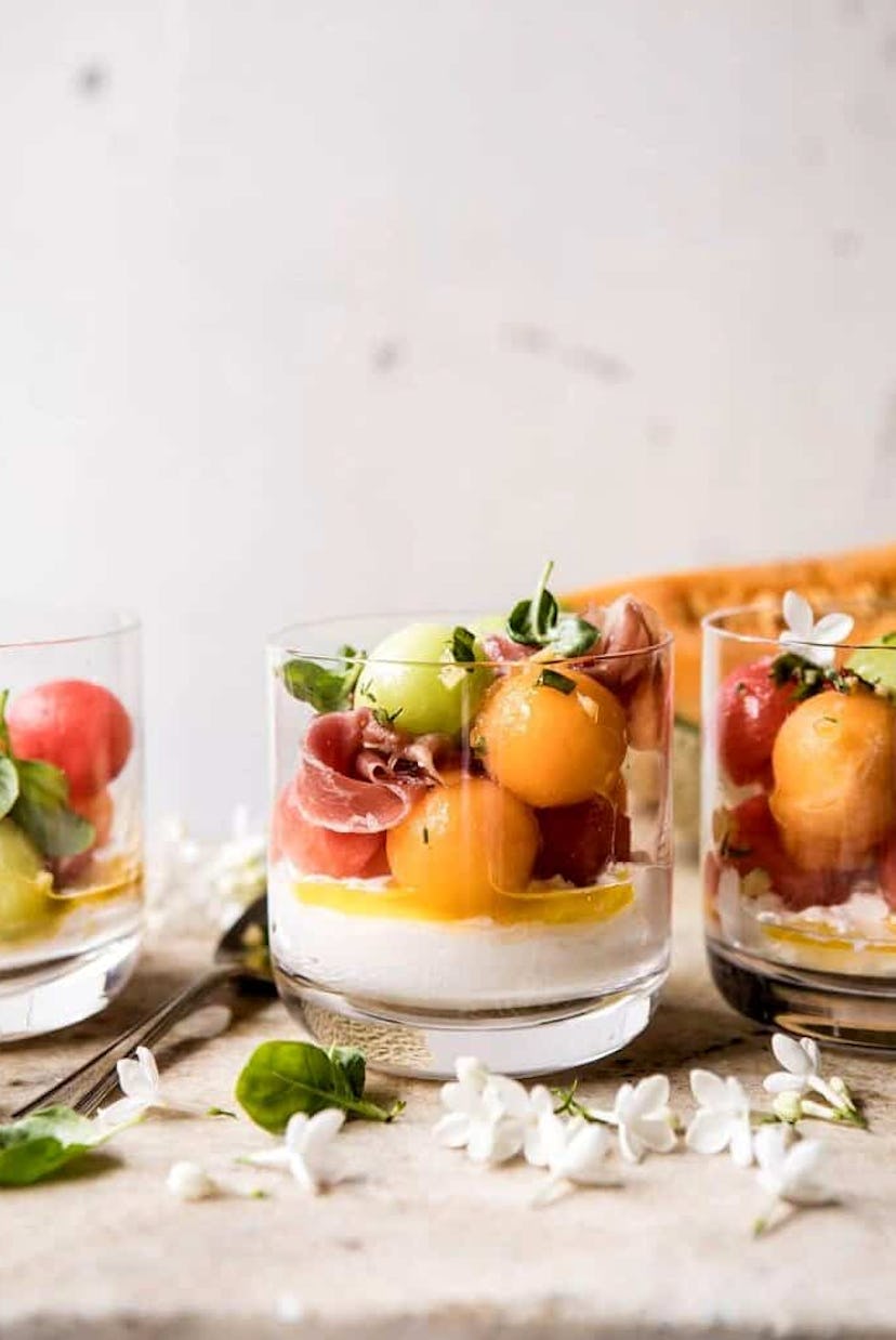 One make-ahead cookout side is this melon caprese salad.