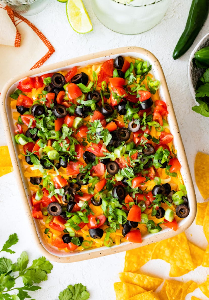 Make this seven-layer dip as a make-ahead cookout side this summer.