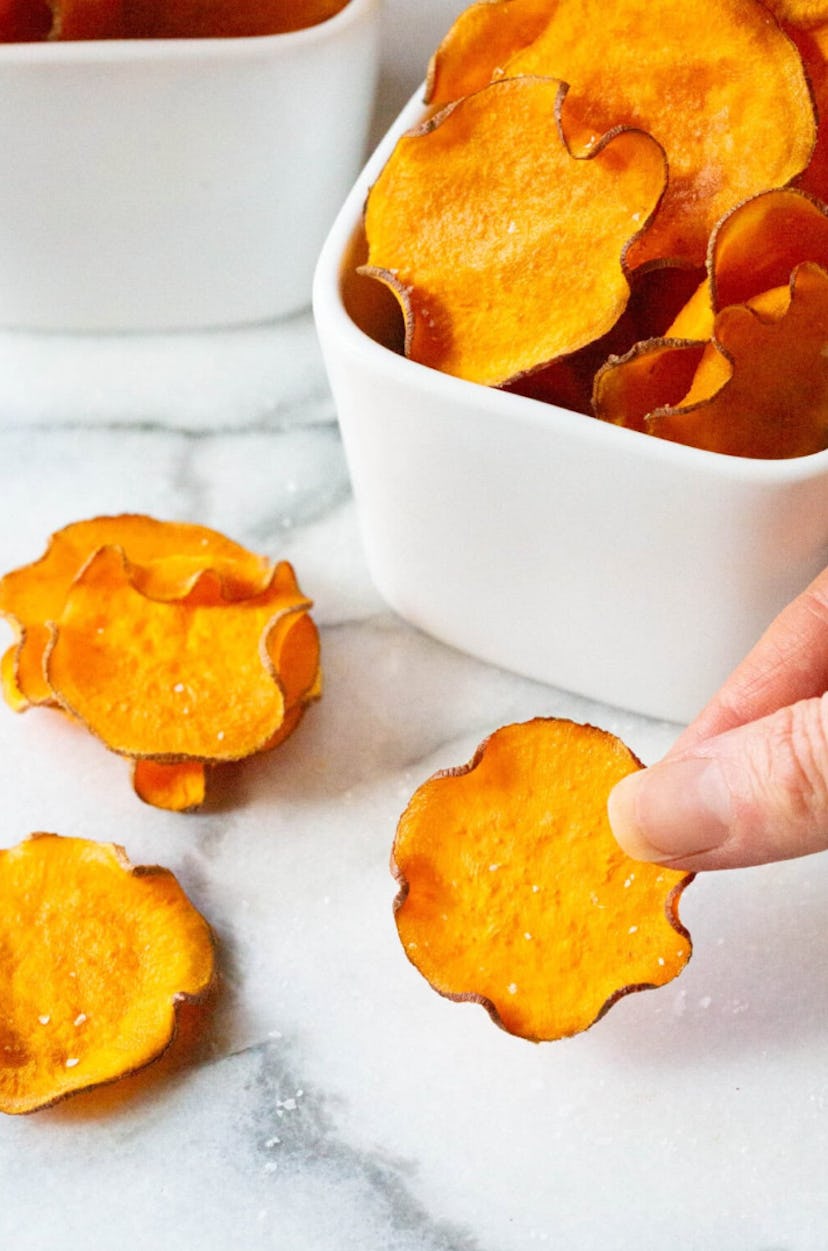 This recipe for baked sweet potato chips is one of the best make-ahed cookout sides.