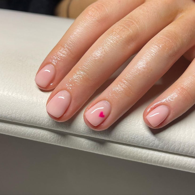Try nails with a single hot pink heart.