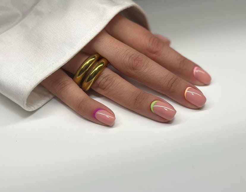 Try subtle neon nail cuffs.