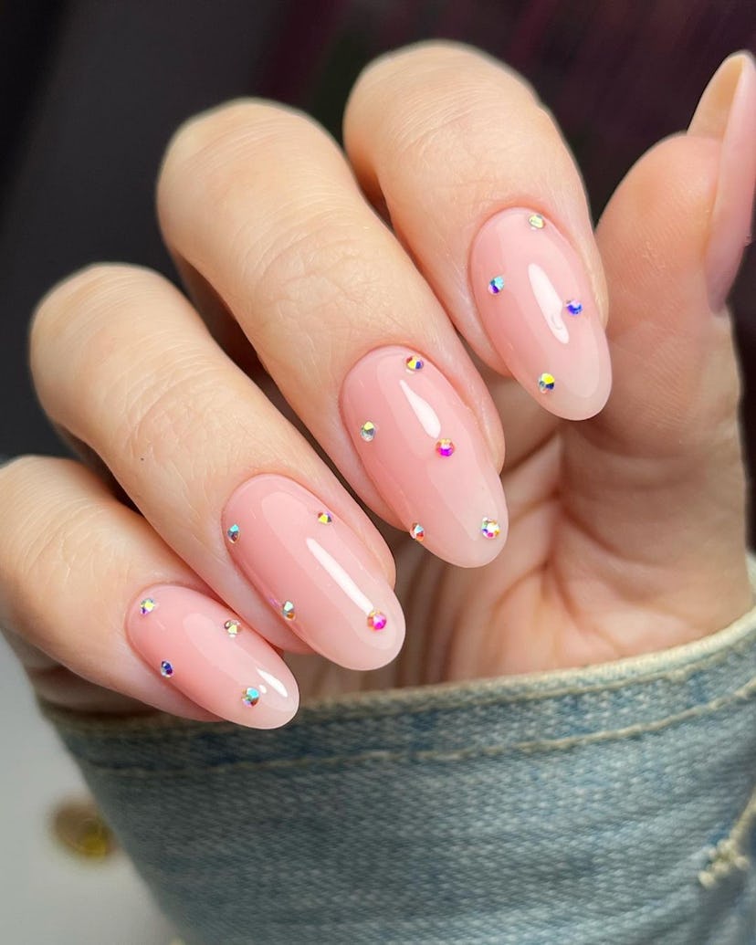 Try simple nails with tiny rhinestones.