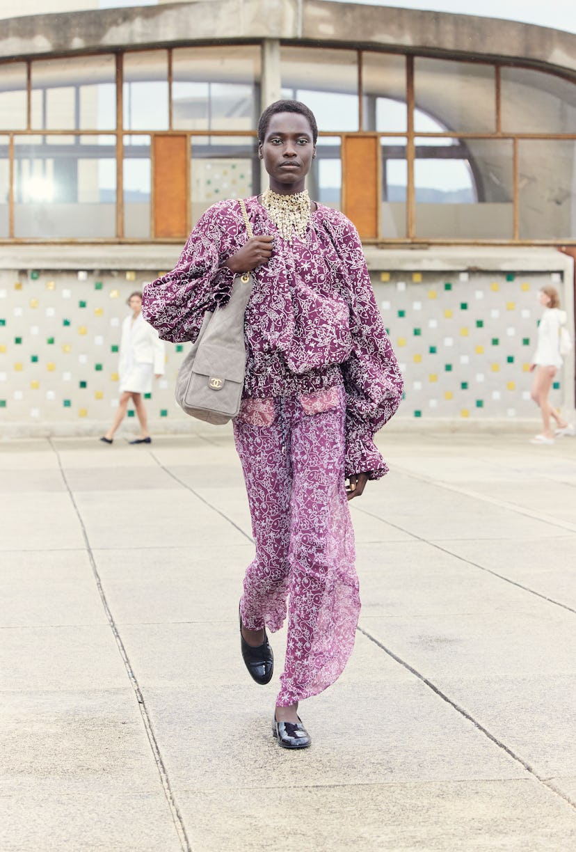 a look from chanel resort 2025 collection at the marseille runway show
