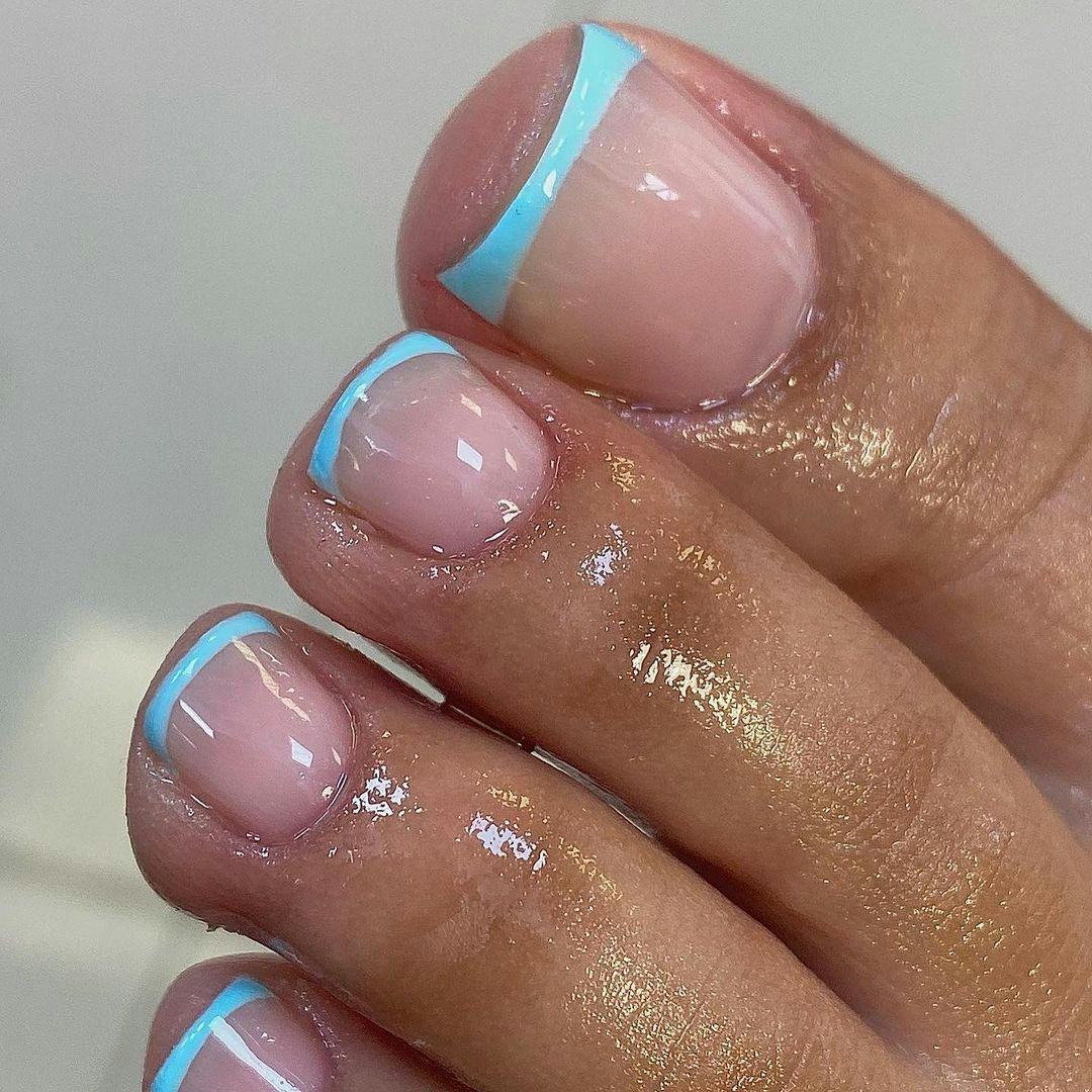 Sky blue French tip pedicures are perfect for Gemini season 2024.