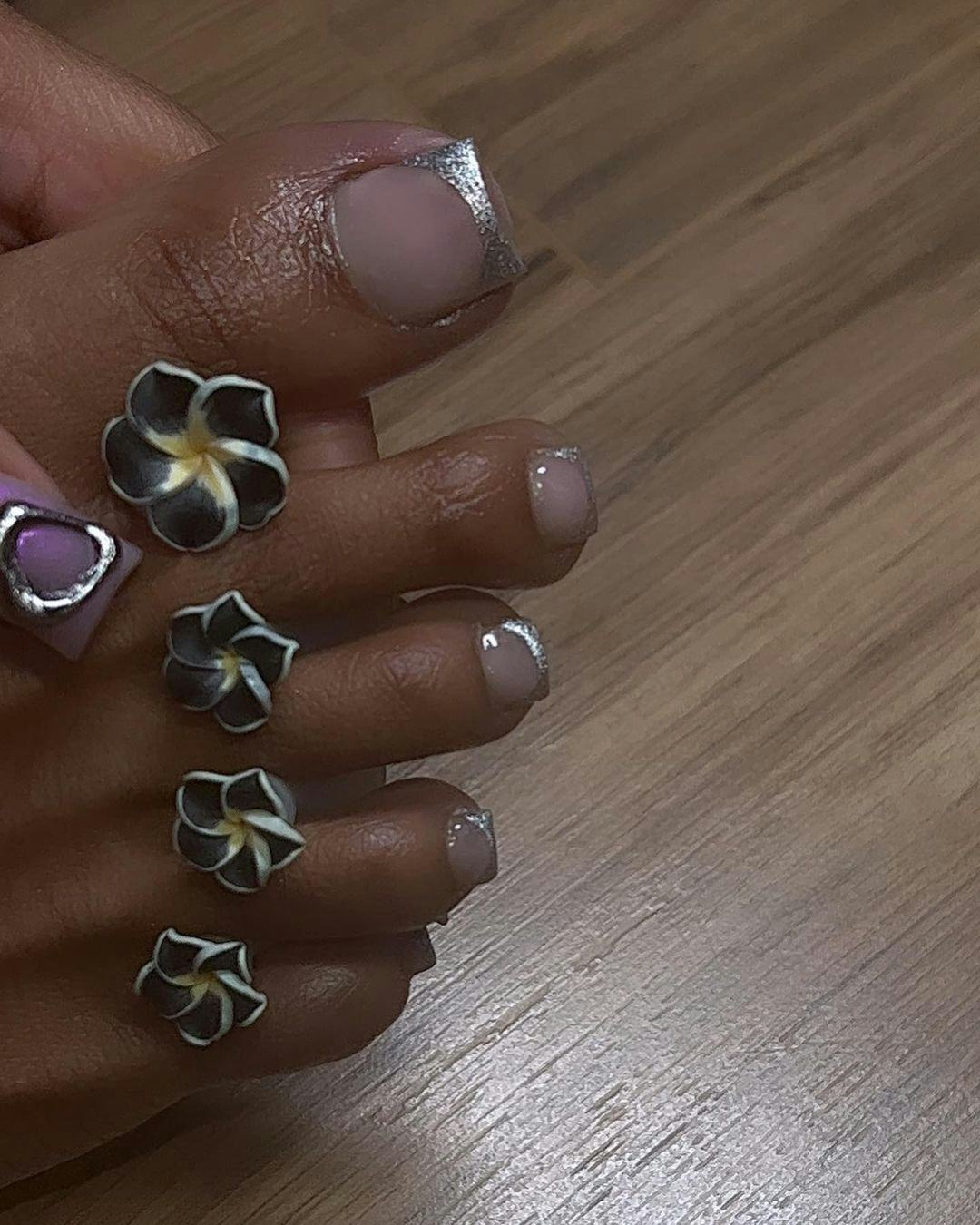 Silver chrome French tip pedicures are perfect for Gemini season 2024.