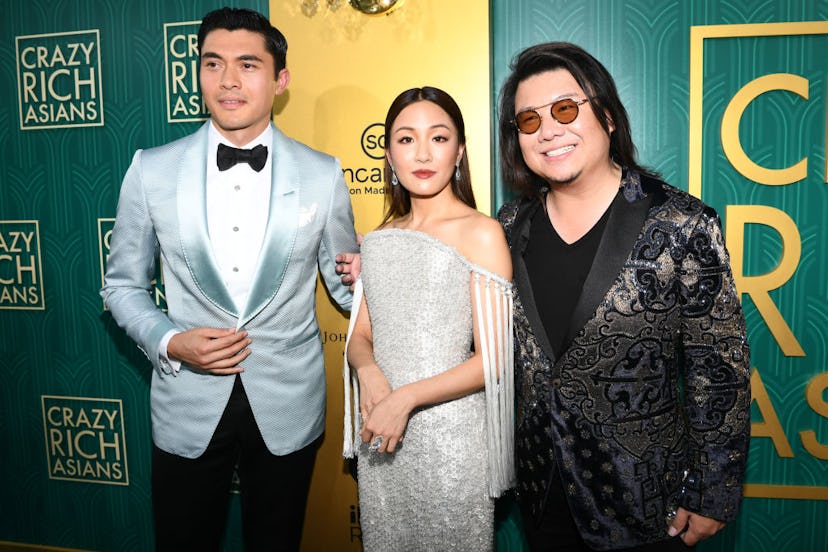 Actor Henry Golding, actress Constance Wu, and Kevin Kwan arrive at Warner Bros. Pictures’ ‘Crazy Ri…