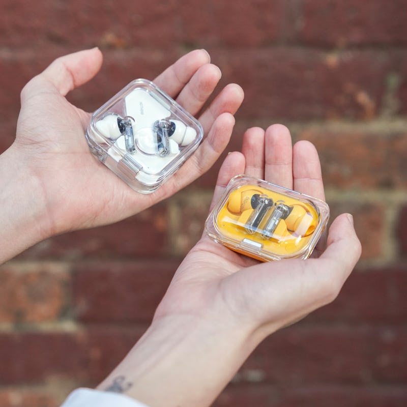 Nothing's Ear (2024) wireless earbuds with ANC and the Nothing Ear A wireless earbuds in yellow.