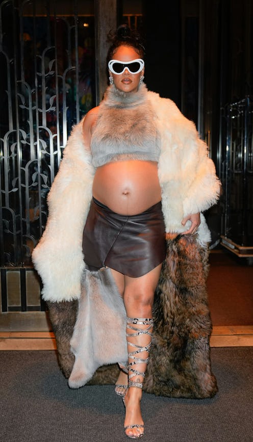 Rihanna stepped out in New York City wearing a fur outfit with lace-up sandals and a massive 9-carat...