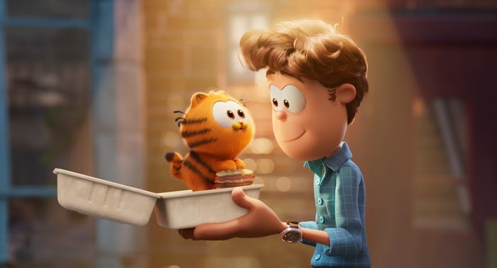 Garfield as a baby and Jon Arbuckle in 'The Garfield Movie'