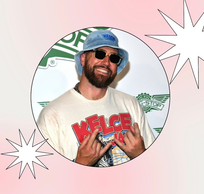 A man in a white "Kelce" T-shirt and blue bucket hat, smiling with sunglasses, making a peace sign g...