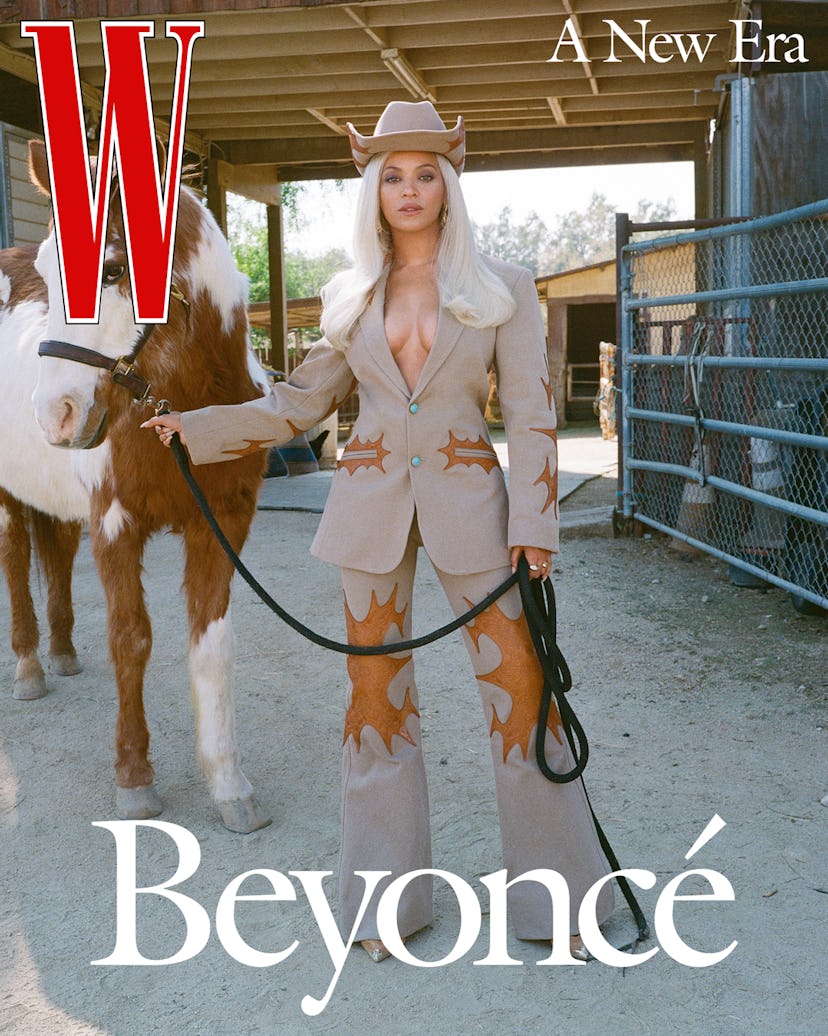 Beyoncé in Louis Vuitton suit with horse.