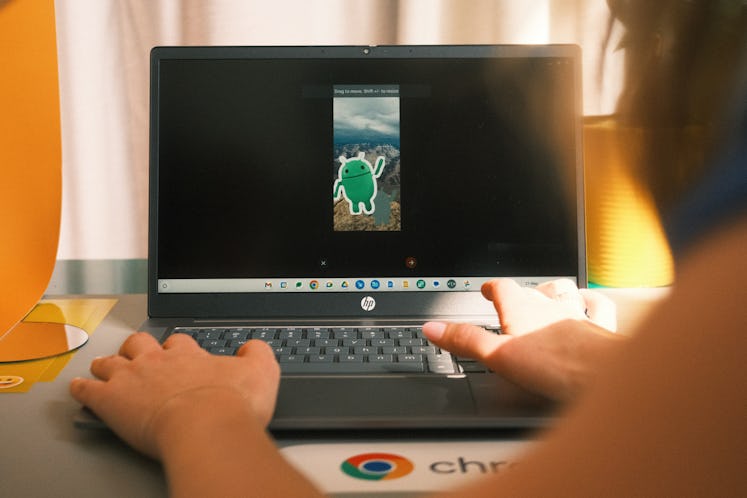 An HP Google Chromebook Plus demonstrating Magic Editor on Google Photos.