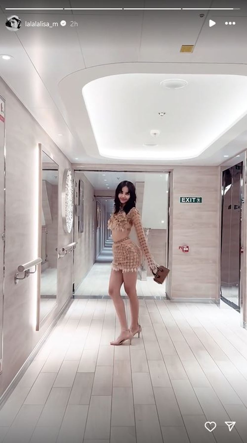 Blackpink’s Lisa showed off a crop top and skirt set made from plastic waste.