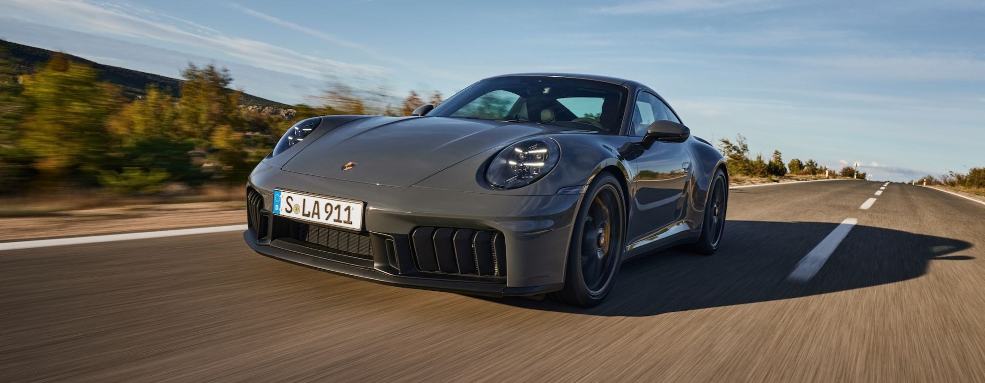 Porsche’s First Hybrid 911 Has Tons of Speed — But Tesla’s Model S Plaid Still Wins