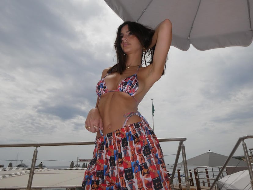 Emily Ratajkowski wore a bikini and butt printed bikini while in Monaco for the Grand Prix race.