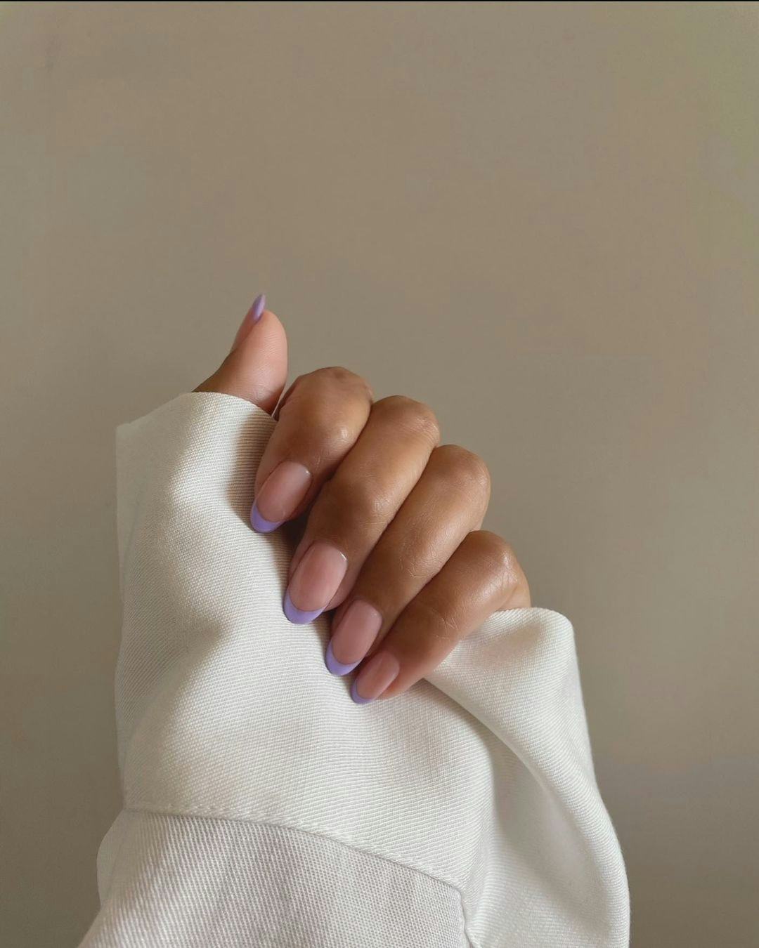 Pastel nail art details are trending for summer 2024.
