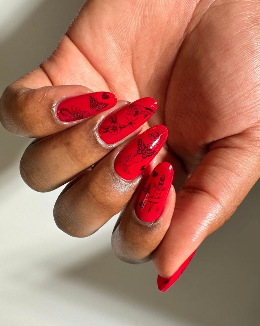 Nail tattoos are trending for summer 2024.