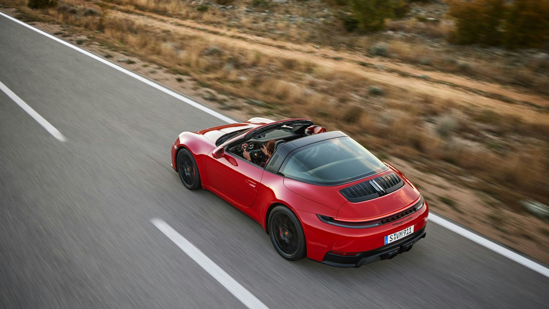 Porsche’s First Hybrid 911 Has Tons of Speed — But Tesla’s Model S Plaid Still Wins