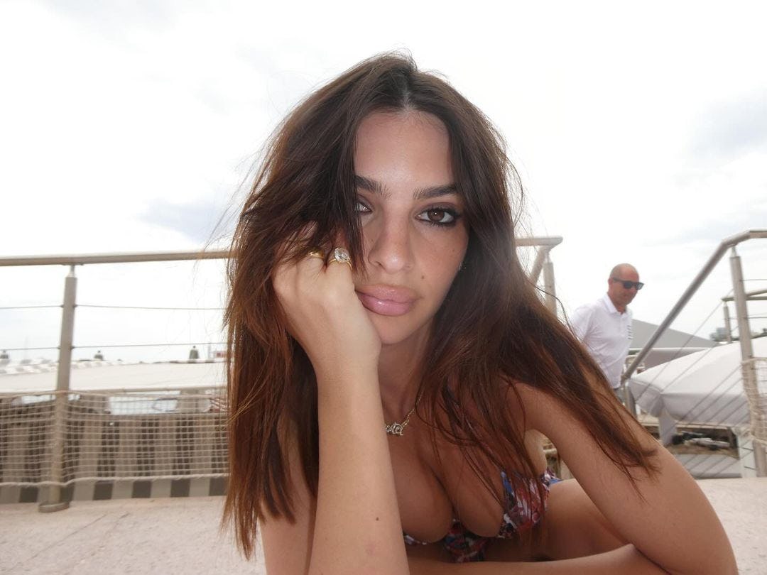 Emily Ratajkowski wears a stringy printed bikini.