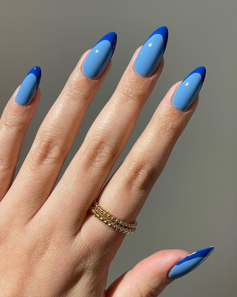 Try a two-toned blue French tip manicure.