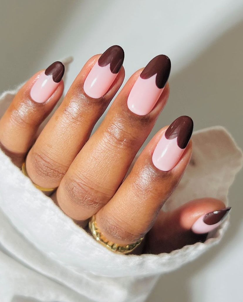 Try chocolate brown heart-shaped French nails.