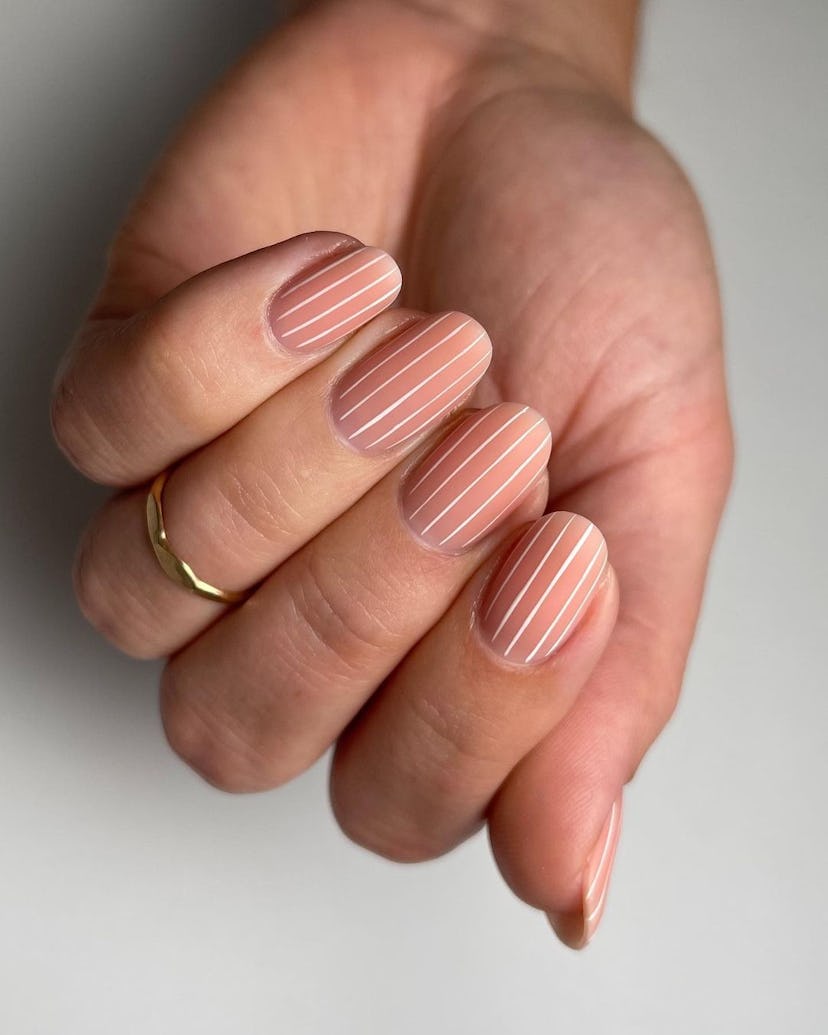 Try nails with thin white pin stripes.