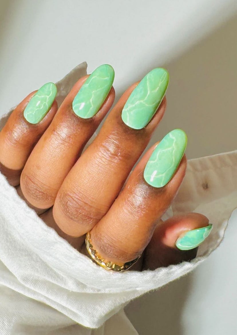 Try jade green nails with marbled detailing