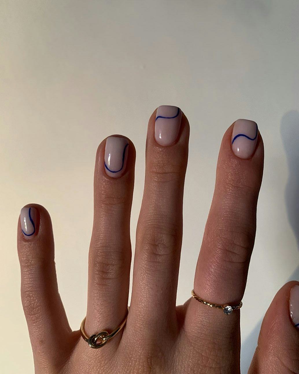 Try nails with deep blue squiggles.