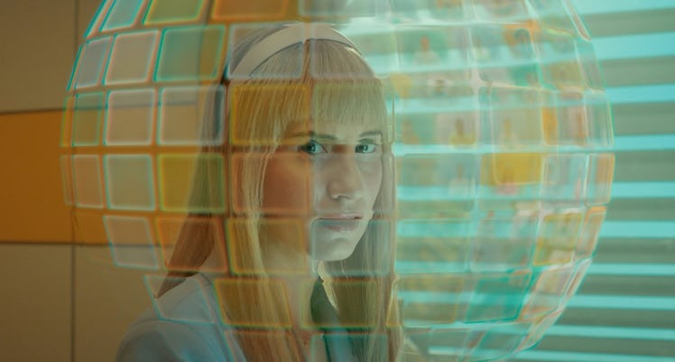 A digital sphere of screens surrounds Lindy's (Callie Cooke) head in "Dot and Bubble"
