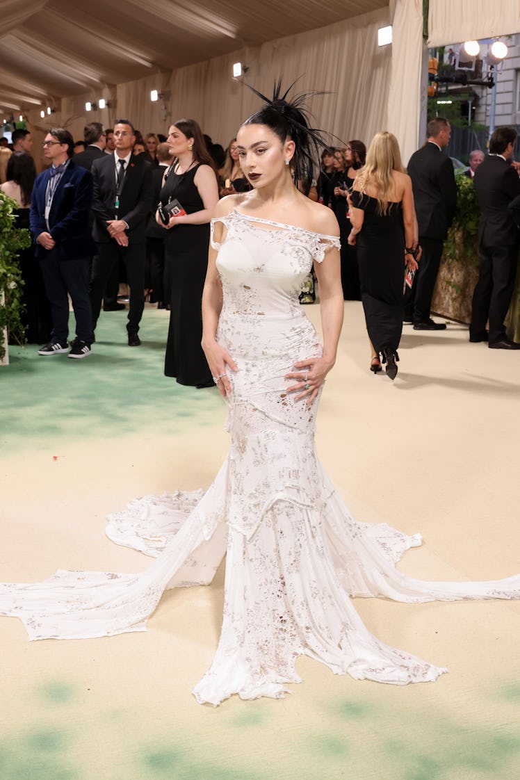 Charli XCX attends The 2024 Met Gala Celebrating "Sleeping Beauties: Reawakening Fashion" at The Met...