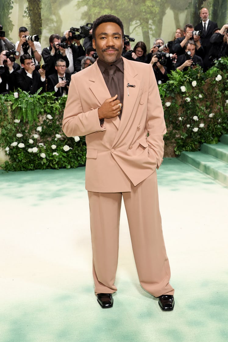 Donald Glover attends The 2024 Met Gala Celebrating "Sleeping Beauties: Reawakening Fashion" at The ...