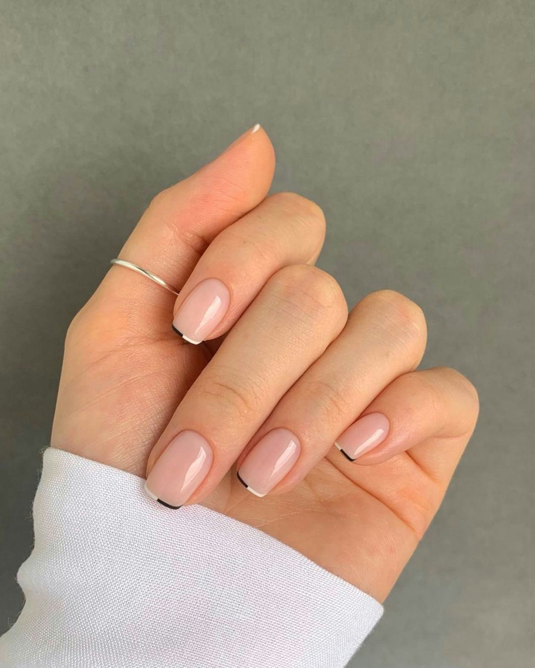 Try split-tone micro French tip nails.