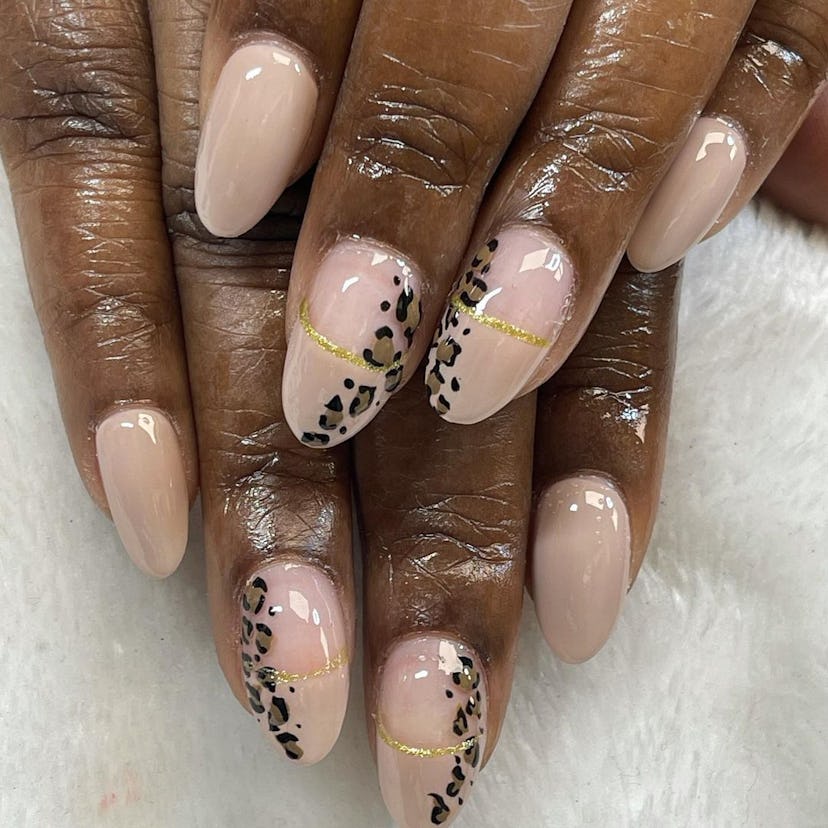 Try neutrals nails with a subtle leopard print design.