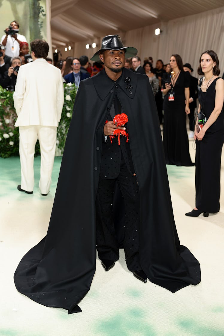 Usher attends The 2024 Met Gala Celebrating "Sleeping Beauties: Reawakening Fashion" at The Metropol...