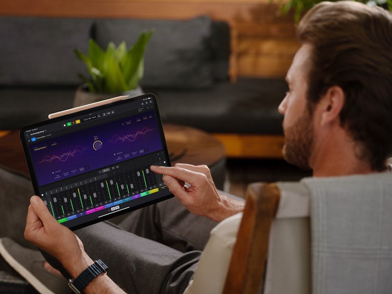 Man on iPad using Logic Pro for the new 2024 iPad Pro