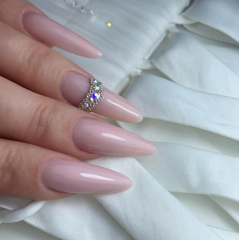 Check out these 40 wedding nail designs.