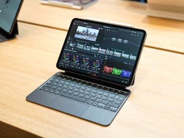 The 11-inch iPad Pro with nano-texture display running DaVinci Resolve while attached to the new Mag...