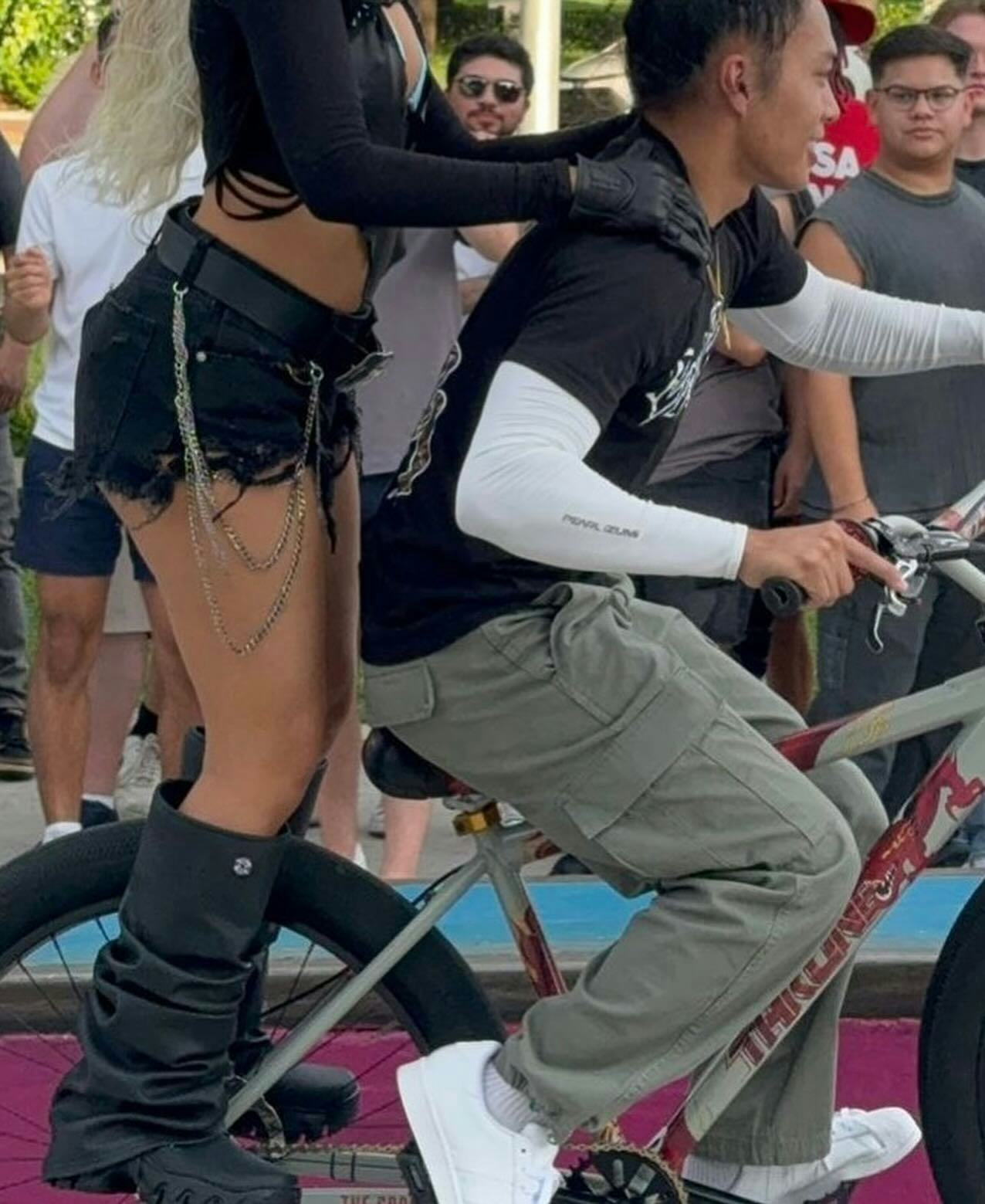 Camila Cabello on Instagram wearing denim cutoff shorts with a Y2K belt chain.