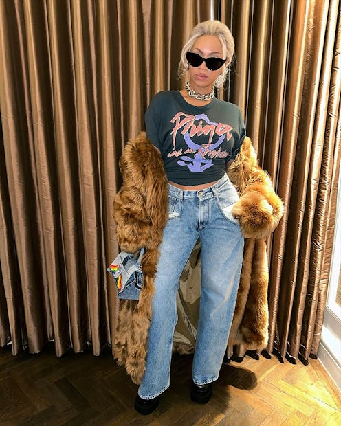 Beyonce fur coat jeans and t-shirt