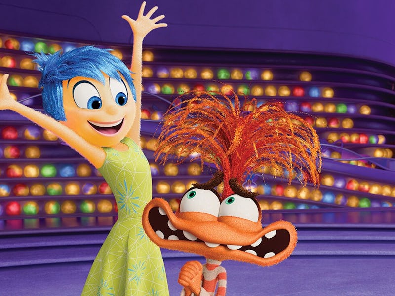 Animated characters Joy and Bing Bong from "Inside Out" are in a vibrant, colorful setting, expressi...