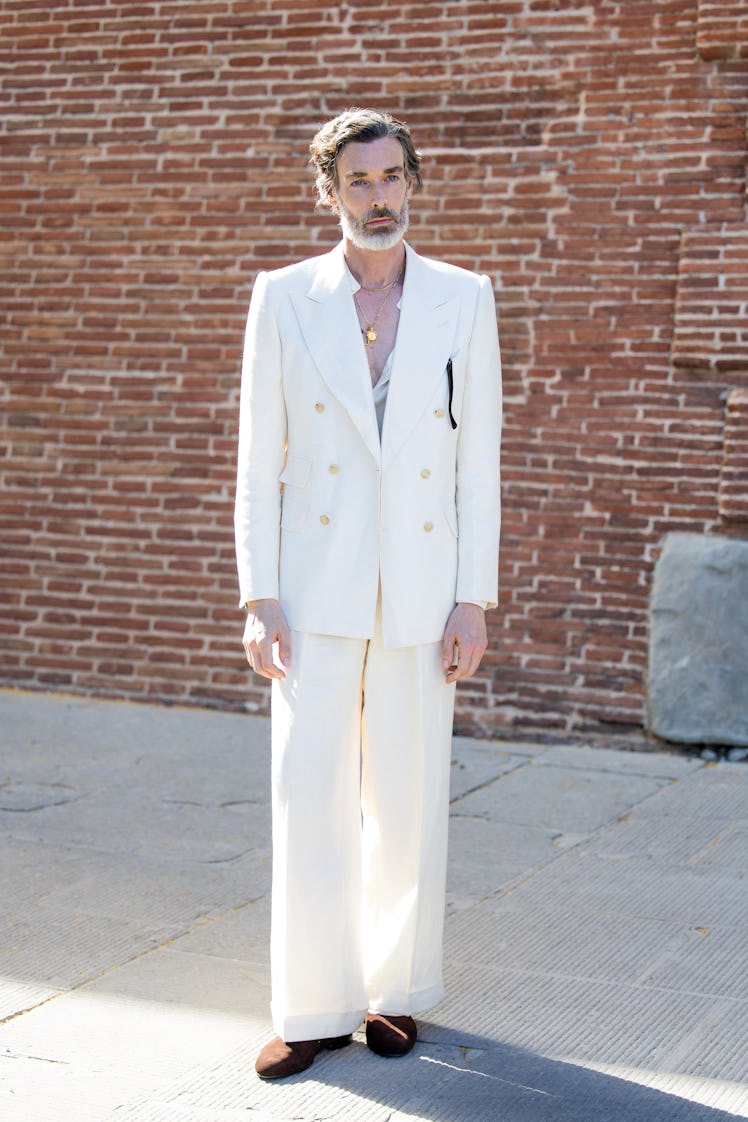 Richard Biedul wears white suit during Pitti Immagine Uomo 106 on June 12, 2024 in Florence, Italy.