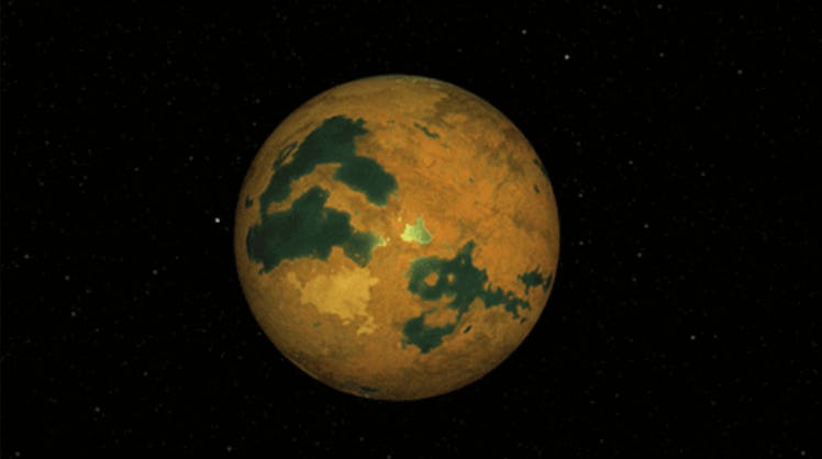 image of a brown and green planet in space