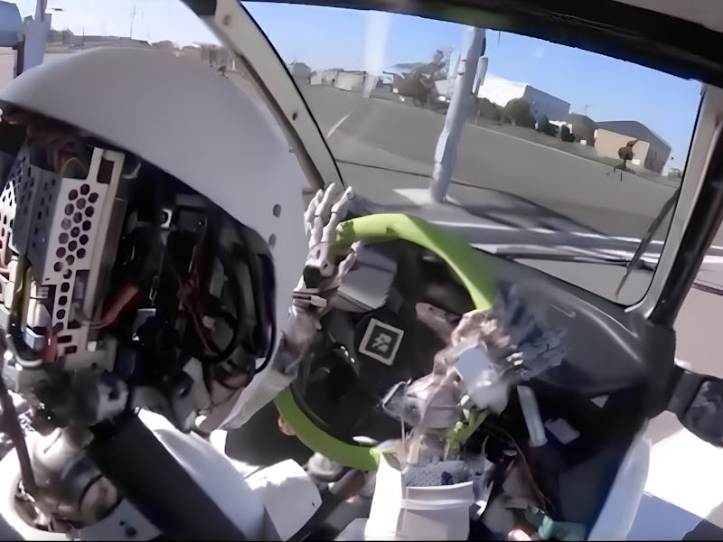 A humanoid robot that can manually drive a car