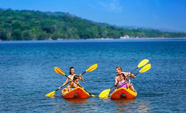 Make new memories through resort activities like kayaking, paddleboarding, and swimming with dolphins  