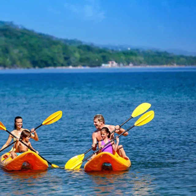 Make new memories through resort activities like kayaking, paddleboarding, and swimming with dolphins