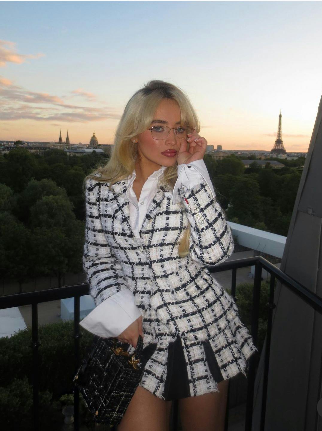 Sabrina Carpenter wears look 30 from Thom Browne’s Fall/Winter 2024 runway show while in Paris.
