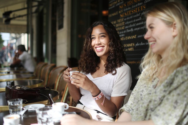 Women enjoy coffee in France.
